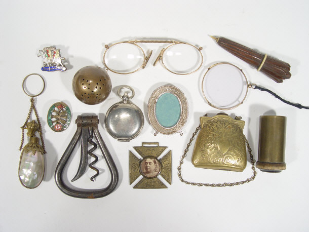 Appraisal: Group of items including a brass purse shaped Sovereign case