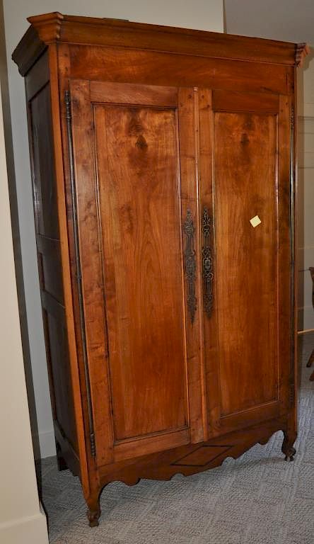 Appraisal: French Directoire Cherry Armoire paneled door with pierced escutcheons on