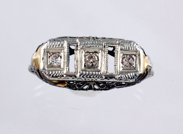 Appraisal: Ladies filigree ring with three diamonds K white gold Three