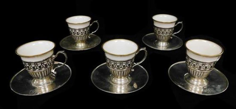 Appraisal: STERLING Five Tiffany Co sterling saucers pierced cups and Lenox