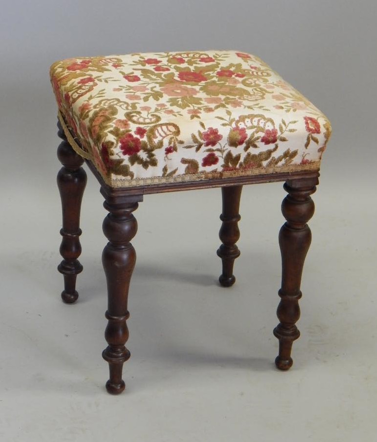 Appraisal: A Victorian mahogany stool with a square top on turned