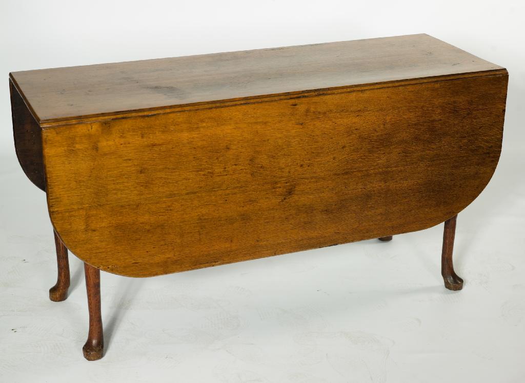 Appraisal: GEORGE III OAK GATELEG DINING TABLE PROBABLY LANCASHIRE the leaves