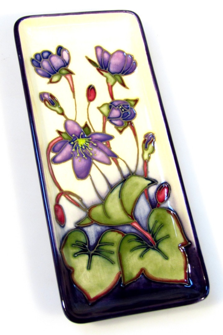 Appraisal: A Moorcroft pottery Hepaticas pattern tray designed by Emma Bossons