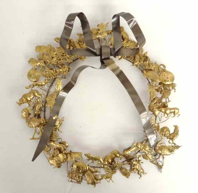 Appraisal: Scarce Dresden brass Christmas wreath with a variety of figures