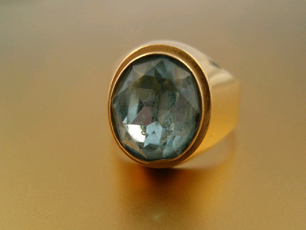 Appraisal: A signet ring set with a pale blue paste to