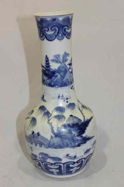 Appraisal: A CHINESE BLUE AND WHITE PORCELAIN BALUSTER VASE with temple