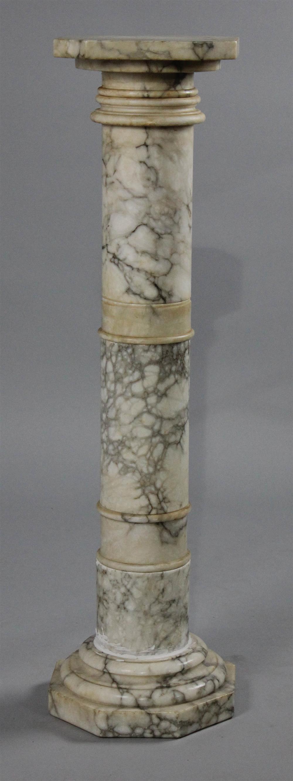 Appraisal: MARBLE COLUMNAR PEDESTAL with a rectangular top over a ring