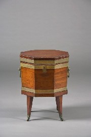 Appraisal: A George III mahogany octagonal cellaret on stand Circa the