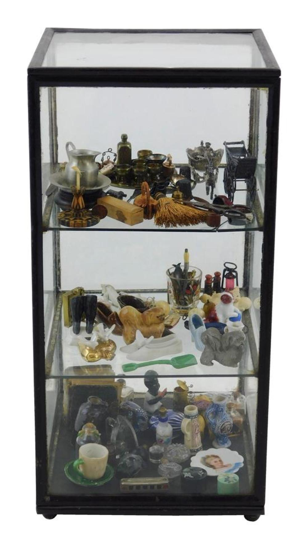 Appraisal: Vintage display case with miniatures including glass shoes monopoly charms