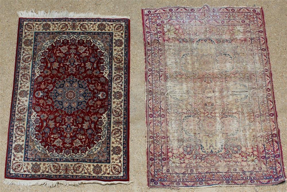 Appraisal: PERSIAN ISFAHAN WOOL RUG TOGETHER WITH AN ANTIQUE ORIENTAL WOOL