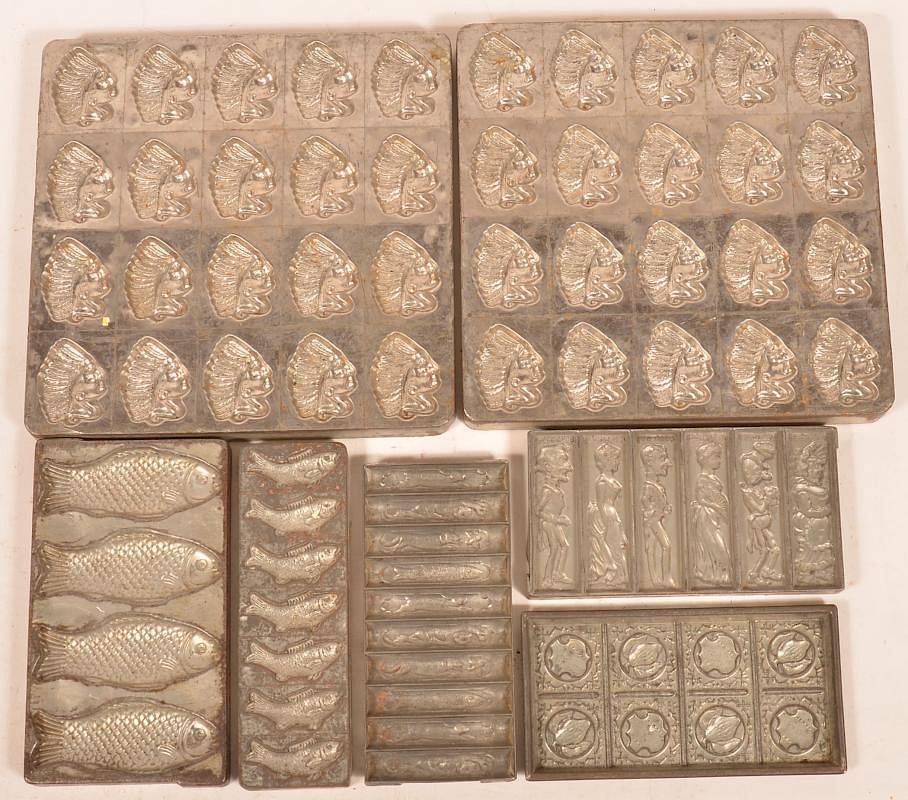 Appraisal: Seven Vintage Tray Form Chocolate Molds Seven Vintage Tray Form