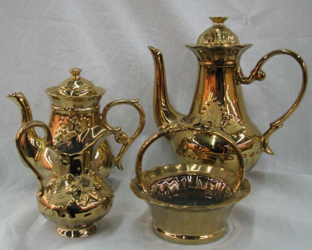 Appraisal: Gold porcelain piece coffee and tea service with coffee and