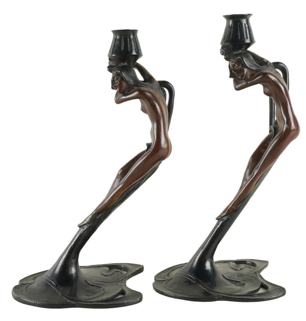 Appraisal: PAIR OF ART NOUVEAU-STYLE FIGURAL CANDLESTICKSbronze Provenance Chuck Fries God