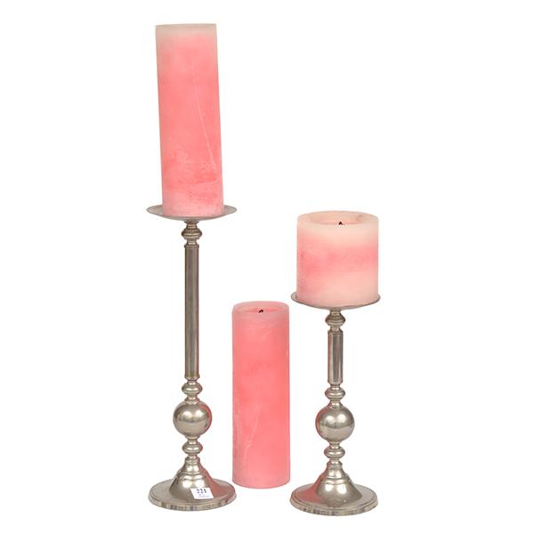 Appraisal: TWO TURNED METAL CANDLE HOLDERS THE TALLEST CM HIGH