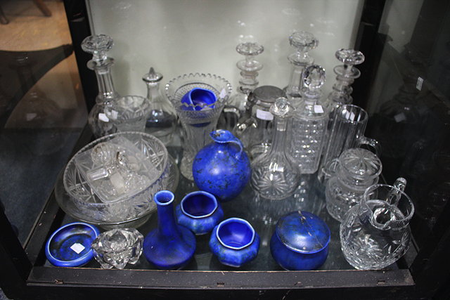 Appraisal: A COLLECTION OF GLASSWARE to include decanters and vases together