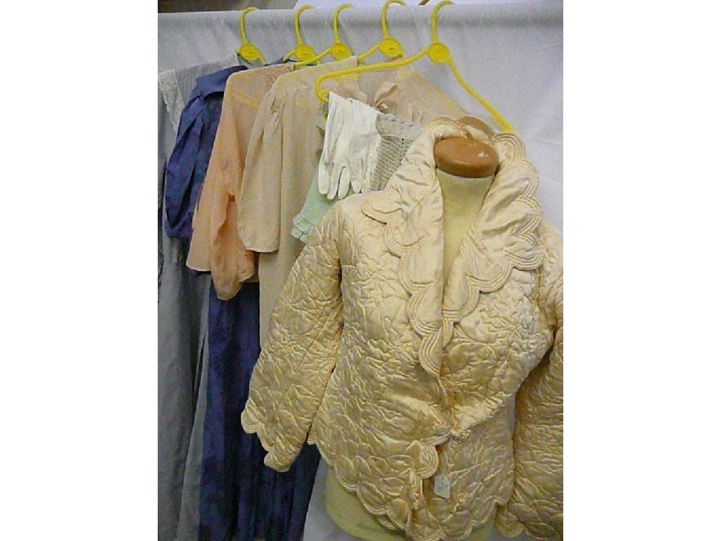 Appraisal: One cream satin quilted bed jacket with scalloped edged collar