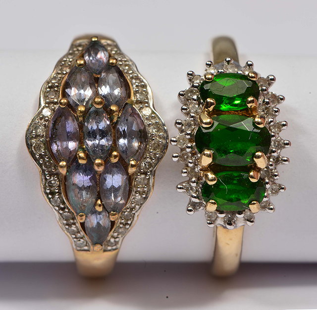 Appraisal: TWO DECORATIVE CT GOLD RINGS set with semi-precious stones