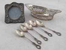 Appraisal: Five silver tea spoons hallmarked Birmingham together with a silver