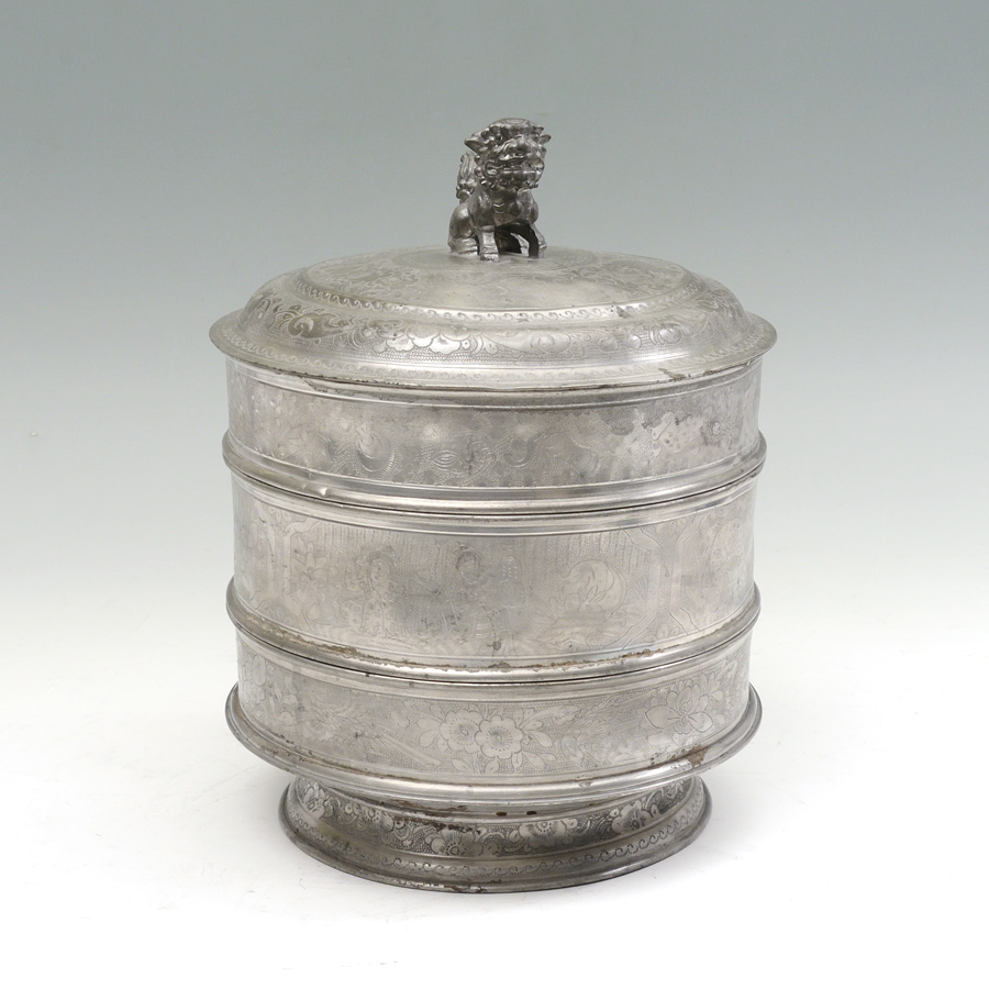 Appraisal: CHINESE ENGRAVED STACKING METAL FOOD BOX Silvered metal stack of