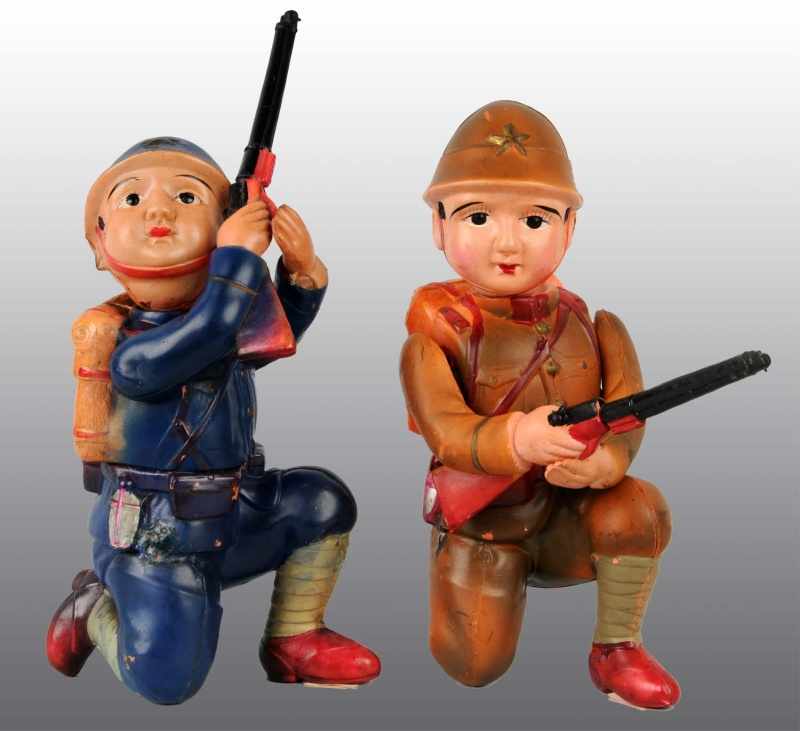 Appraisal: Lot of Celluloid Soldier Wind-Up Toys Description Japanese Pre-war Working