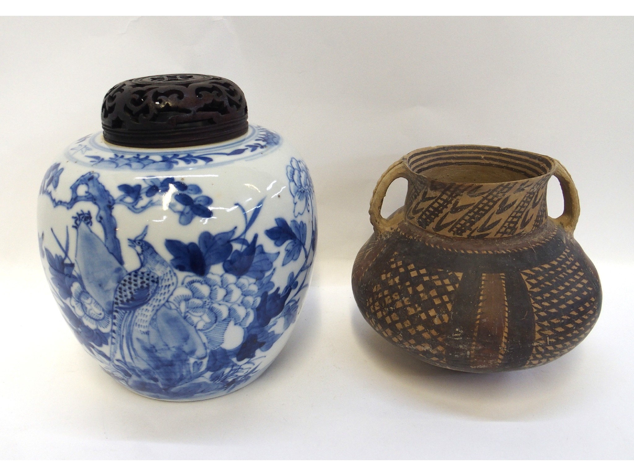 Appraisal: Chinese blue and white ginger jar with wooden lid and