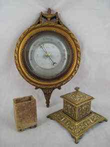 Appraisal: A wall mounted aneroid barometer in gilt frame x cm