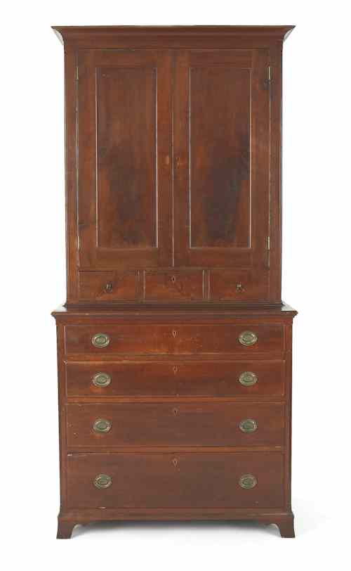 Appraisal: Pennsylvania Federal cherry two-part secretary ca with unusual chamfered corners