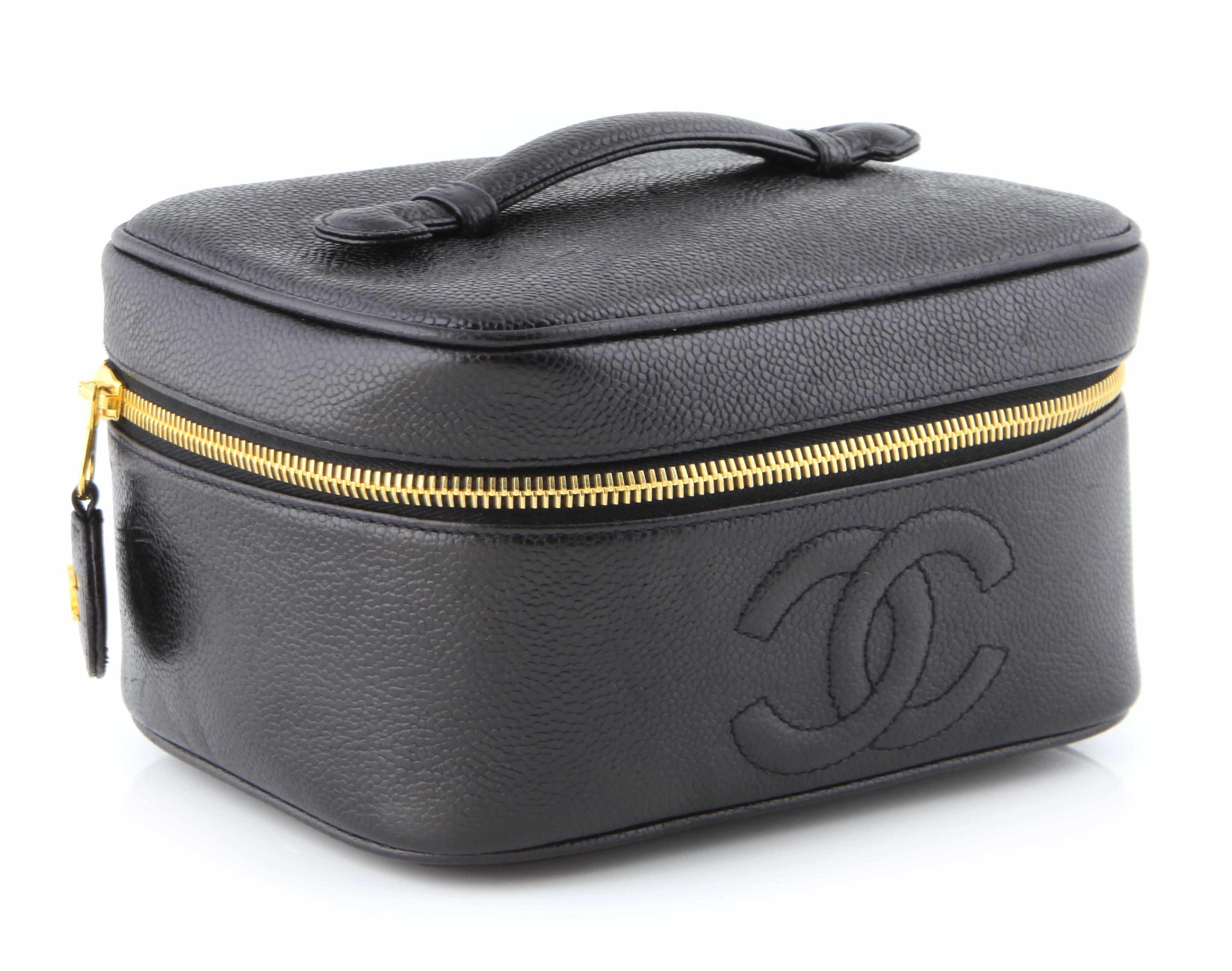 Appraisal: A Chanel small black leather make-up bag size in x