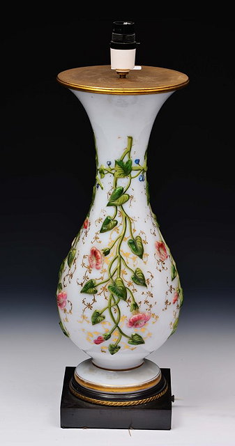 Appraisal: A VICTORIAN OPALINE GLASS AND OVERLAID BALUSTER VASE converted to