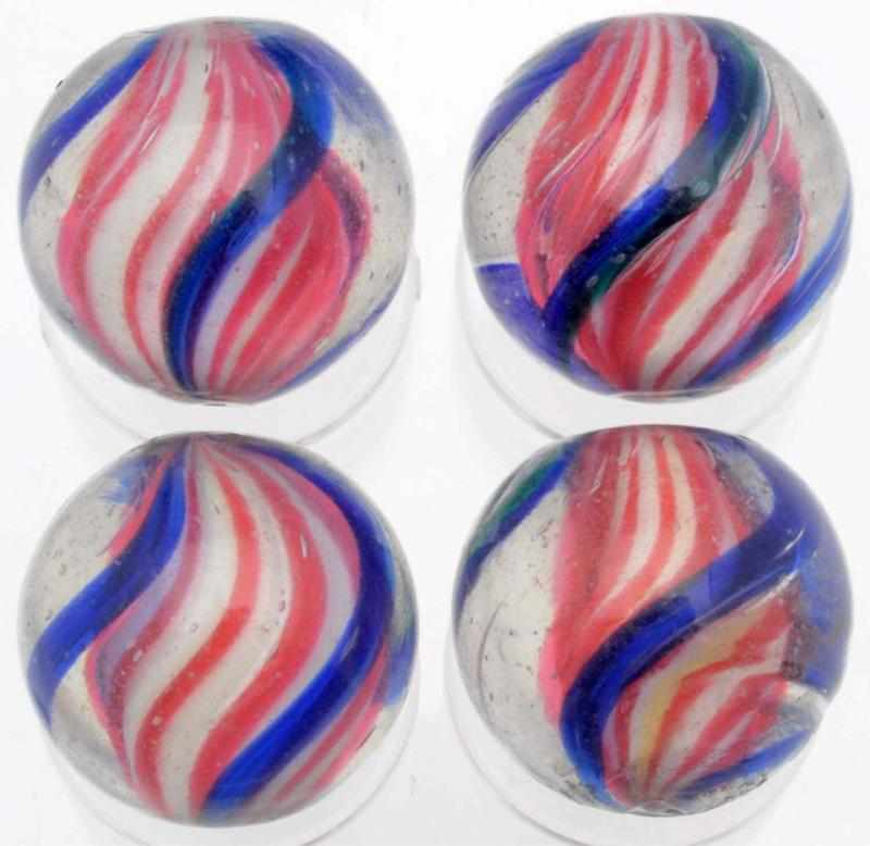 Appraisal: Lot of Same Cane Solid Core Swirl Marbles Nice set