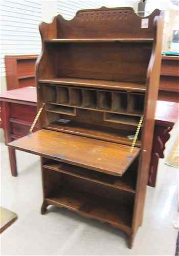 Appraisal: AN OAK SECRETARY BOOKCASE Spencer Barnes Stuart Co Benton Harbor