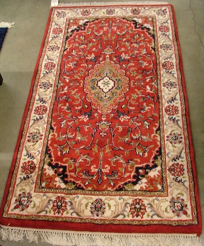 Appraisal: TWO ORIENTAL AREA RUGS Indo-Persians both floral and central floral