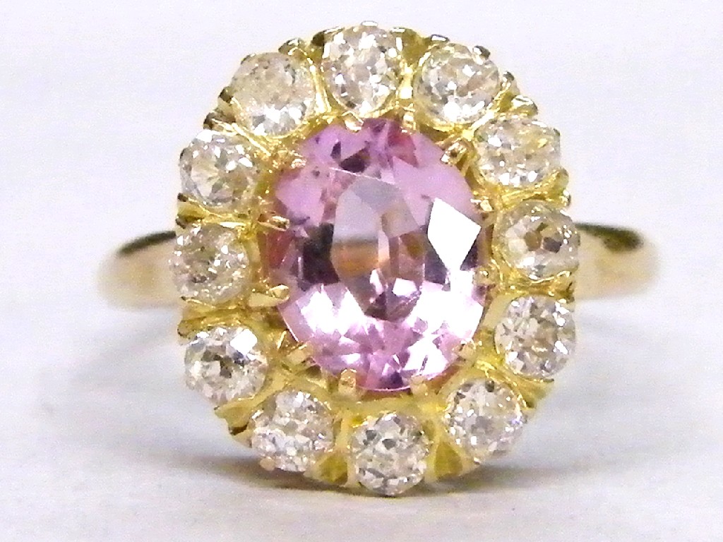 Appraisal: ct pink topaz and diamond oval cluster ring diamonds ct