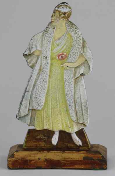 Appraisal: FLAPPER GIRL WITH FUR COAT DOORSTOP cJo Judd woman in