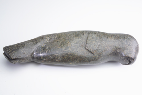 Appraisal: Large Inuit brown serpentine stone sculpture of a sleeping seal