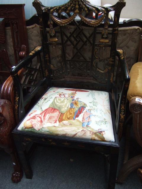 Appraisal: A chinoiserie decorated open armchair the pagoda crest rail over