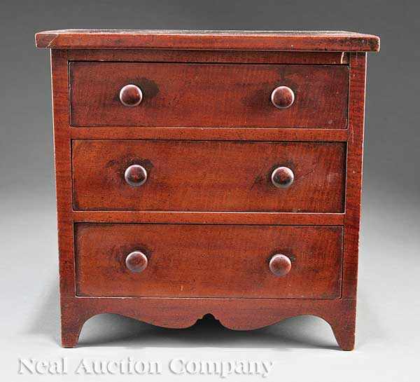 Appraisal: A George III Carved Mahogany Miniature Chest of Drawers th