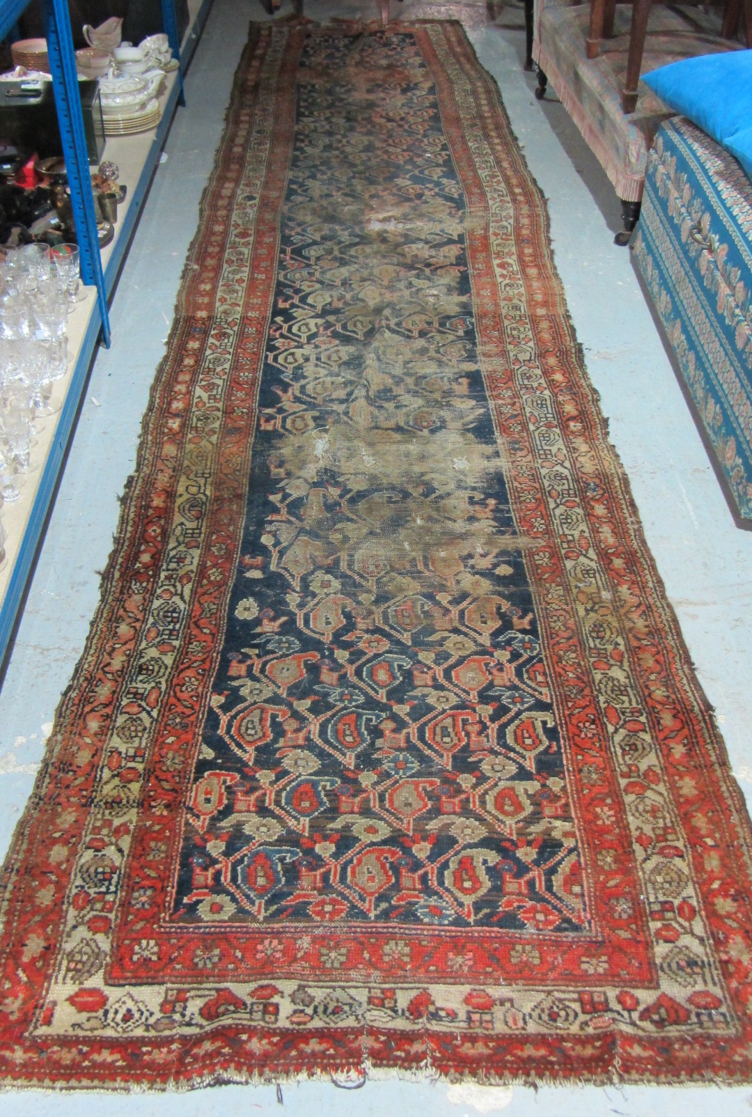 Appraisal: A North West Persian runner indigo field with vines of