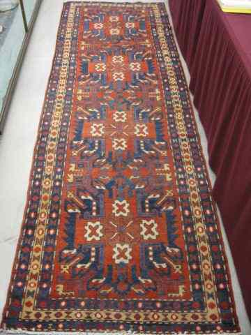 Appraisal: Heriz Persian Handmade Runner geometrics primarily red blues ivory '