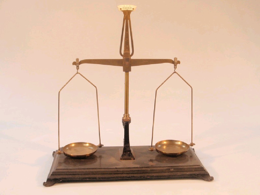 Appraisal: Cast iron and brass beam balance scales