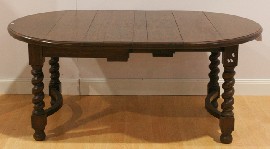 Appraisal: A th century oak extension dining table with Jacobean twist