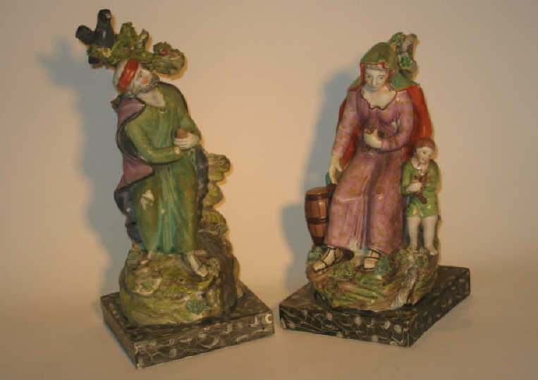 Appraisal: PAIR OF ENGLISH TH CENTURY PRATTWARE FIGURES Of a lady