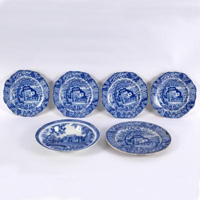 Appraisal: Four Staffordshire blue and white bowls transfer printed Eastern townscapes