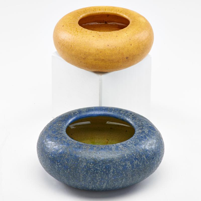 Appraisal: GRUEBY Two small bowls in blue and yellow matte glazes