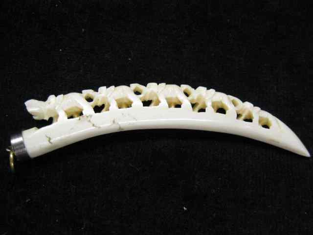 Appraisal: Carved Ivory Pendant bridge of elephants tusk style '' excellent