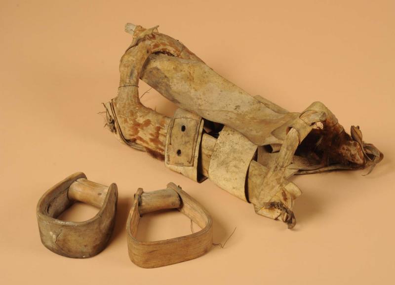 Appraisal: Antler Tree with Rawhide Covering Saddle Circa s- s American