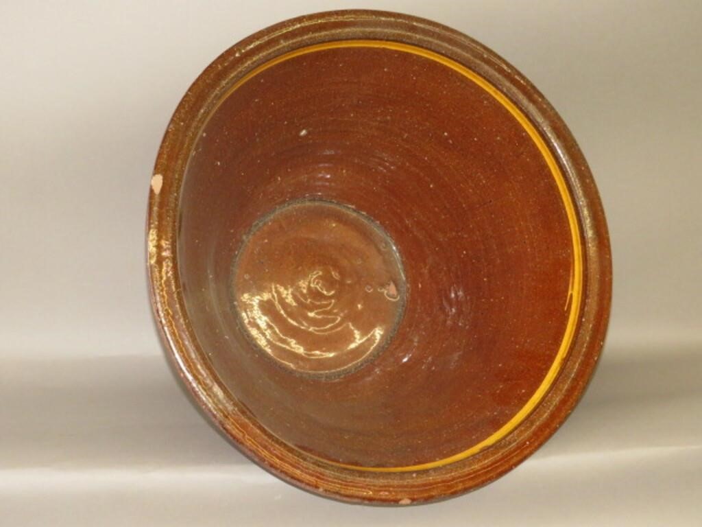 Appraisal: ENORMOUS REDWARE BOWLca late th century enormous taper sided flat