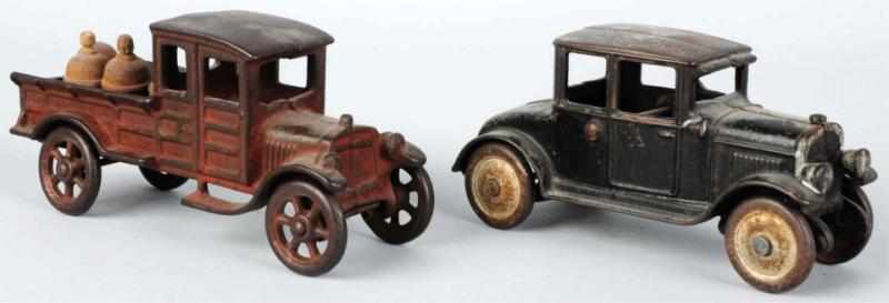 Appraisal: Lot of Cast Iron Vehicle Toys American Includes one sedan