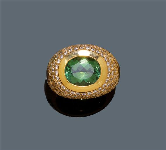 Appraisal: TOURMALINE AND DIAMOND RING Yellow gold g Casual-elegant solid ring