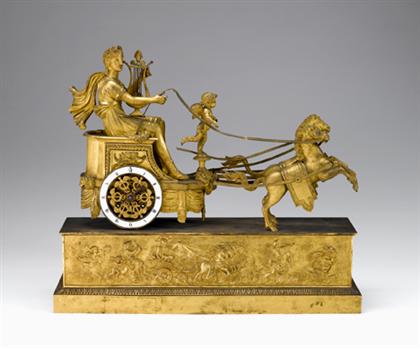 Appraisal: Empire ormolu mantel clock circa The enameled chapter ring with